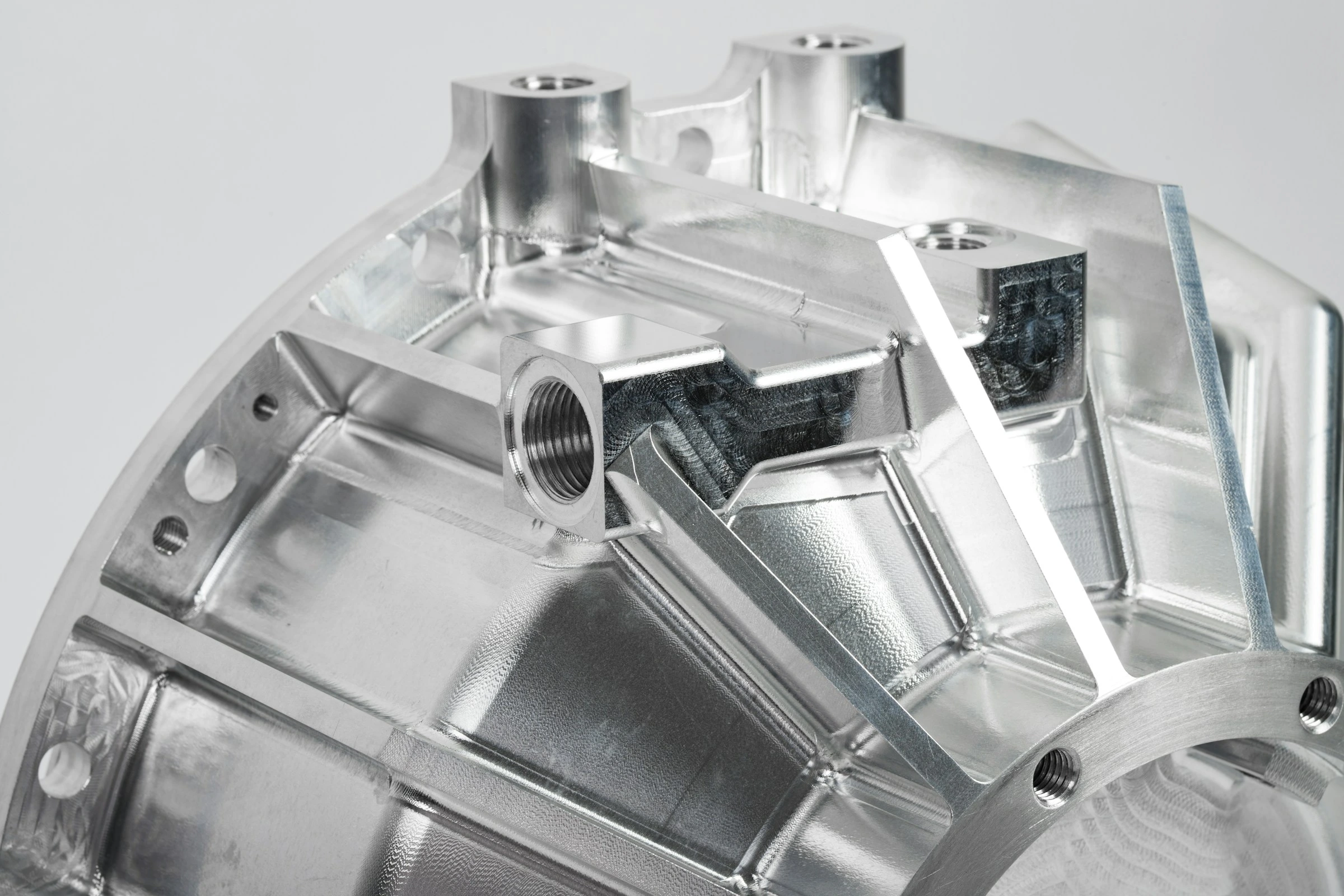 Multi-axis machined metal bracket